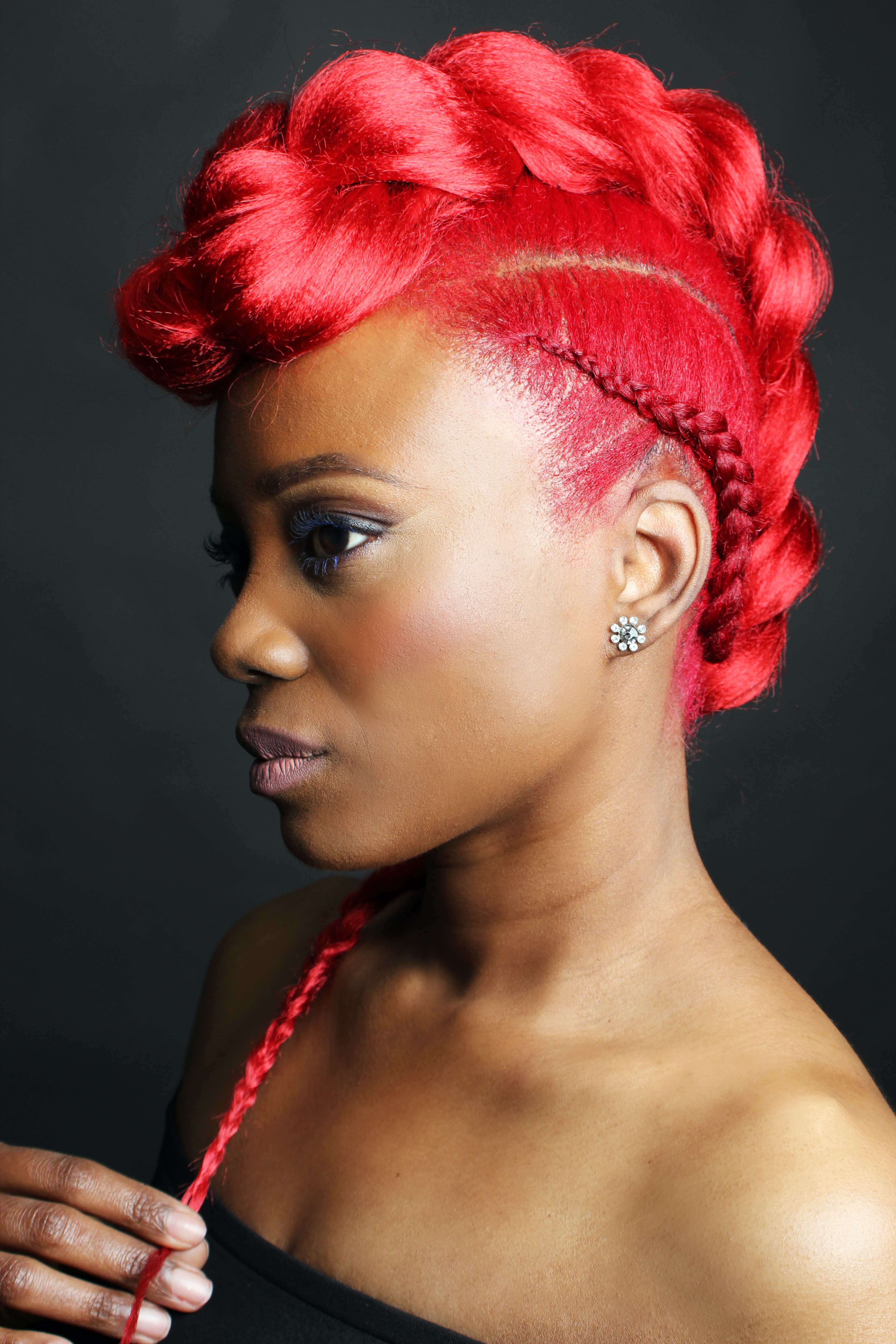 woman wearing makeup and bright red hair